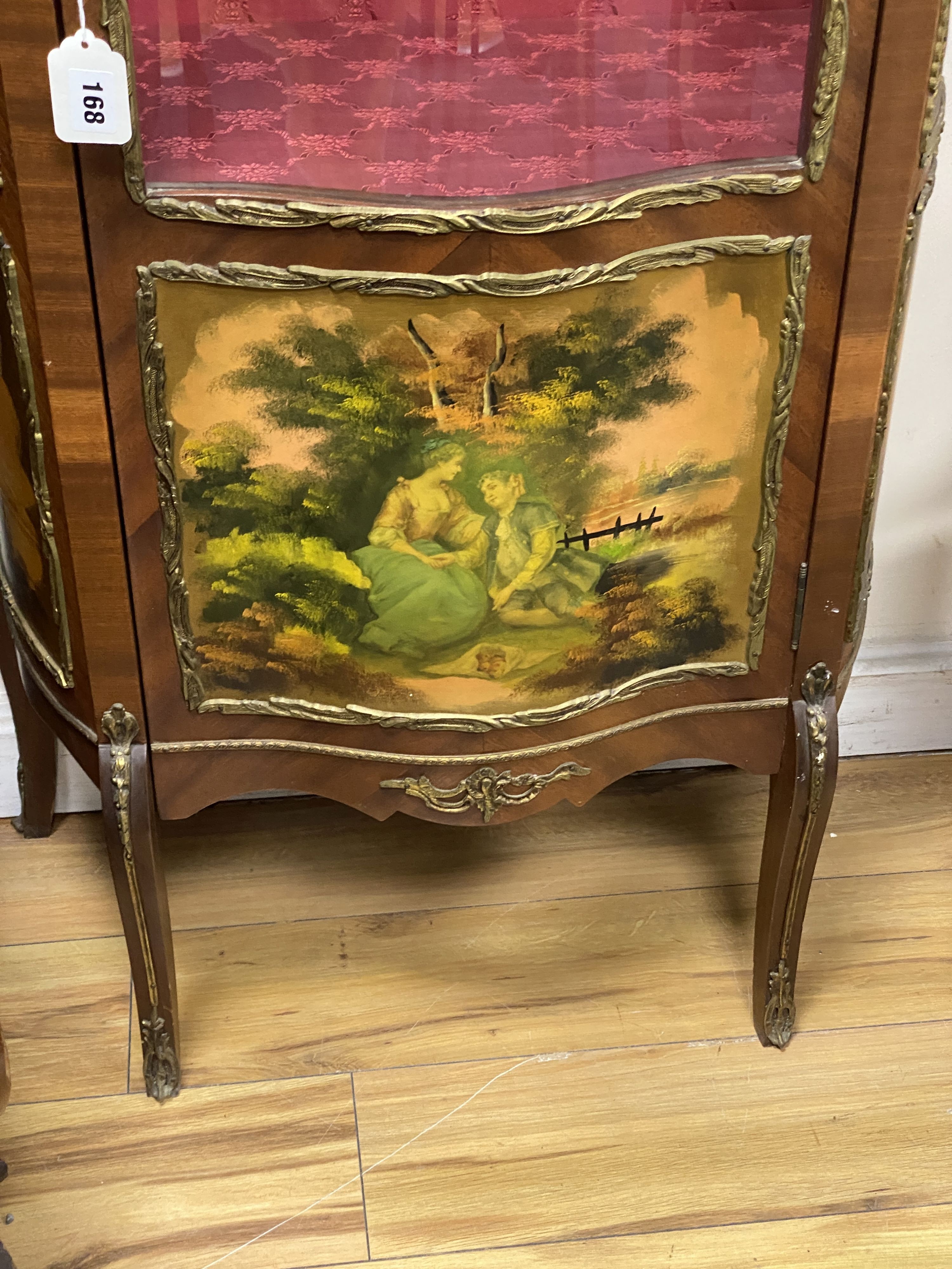 A pair of reproduction gilt metal mounted Vernis Martin style serpentine front vitrine, width 68cm, depth 36cm, height 152cm